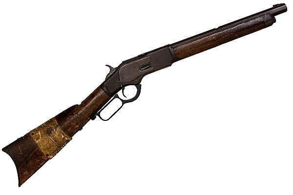 A rifle and badge owned by Billy the Kid's famous killer hit the auction block at Greg Martin's.