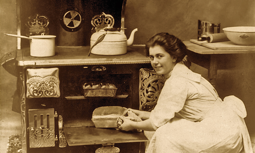Woman Cooking in a 19th Century stove