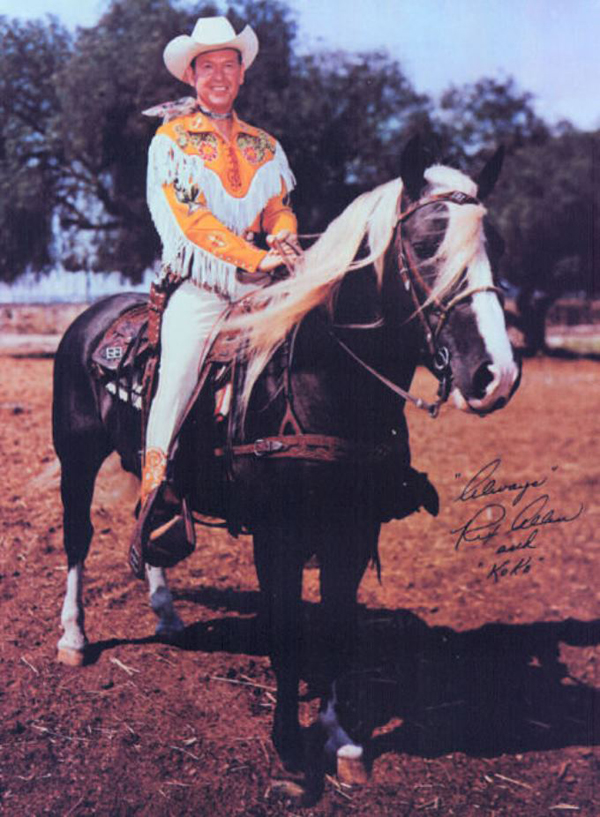 photograph of cowboy Rex Allen dressed in yellow on horse Koko