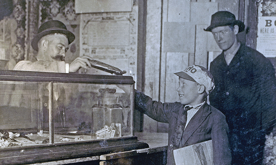 boy buying candy at an old west candy shop true west magazine