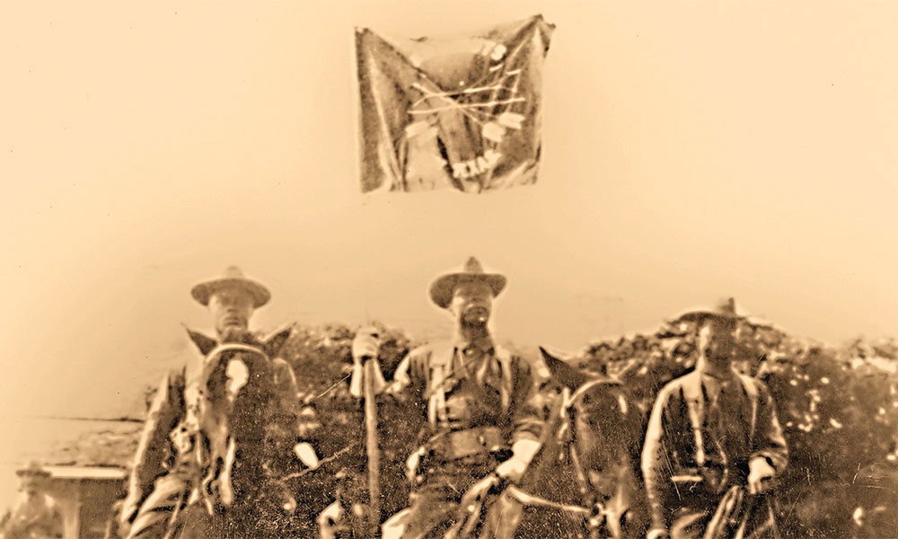 seminole indian scouts on horseback with flag true west magazine