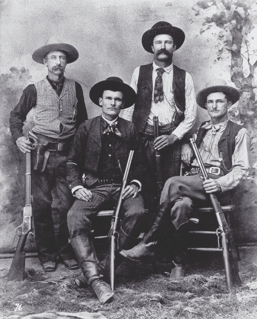 Texas Rangers, standing (l.-r.):Robert “Bob” Speaks and Jim Putnam; seated (l.-r): Alonzo Van “Lon” Oden and Capt. John R. Hughes